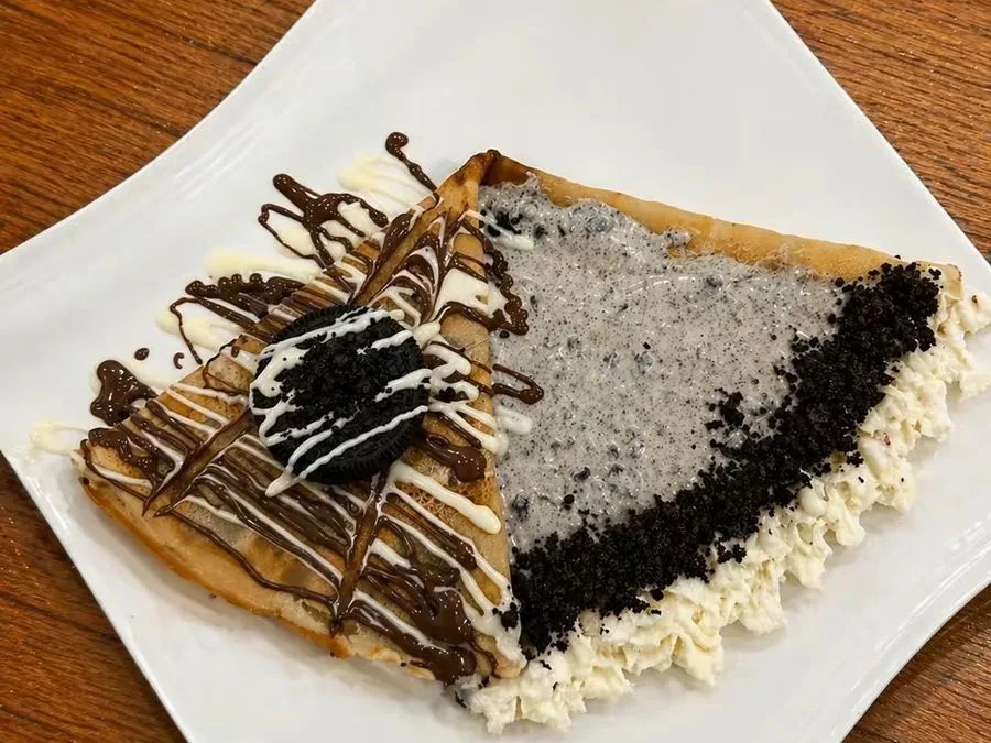 Cookies and cream crepe with chocolate and cream toppings